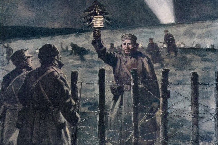 En soldat vid skyttegravarna som håller upp en lykta och en liten gran.